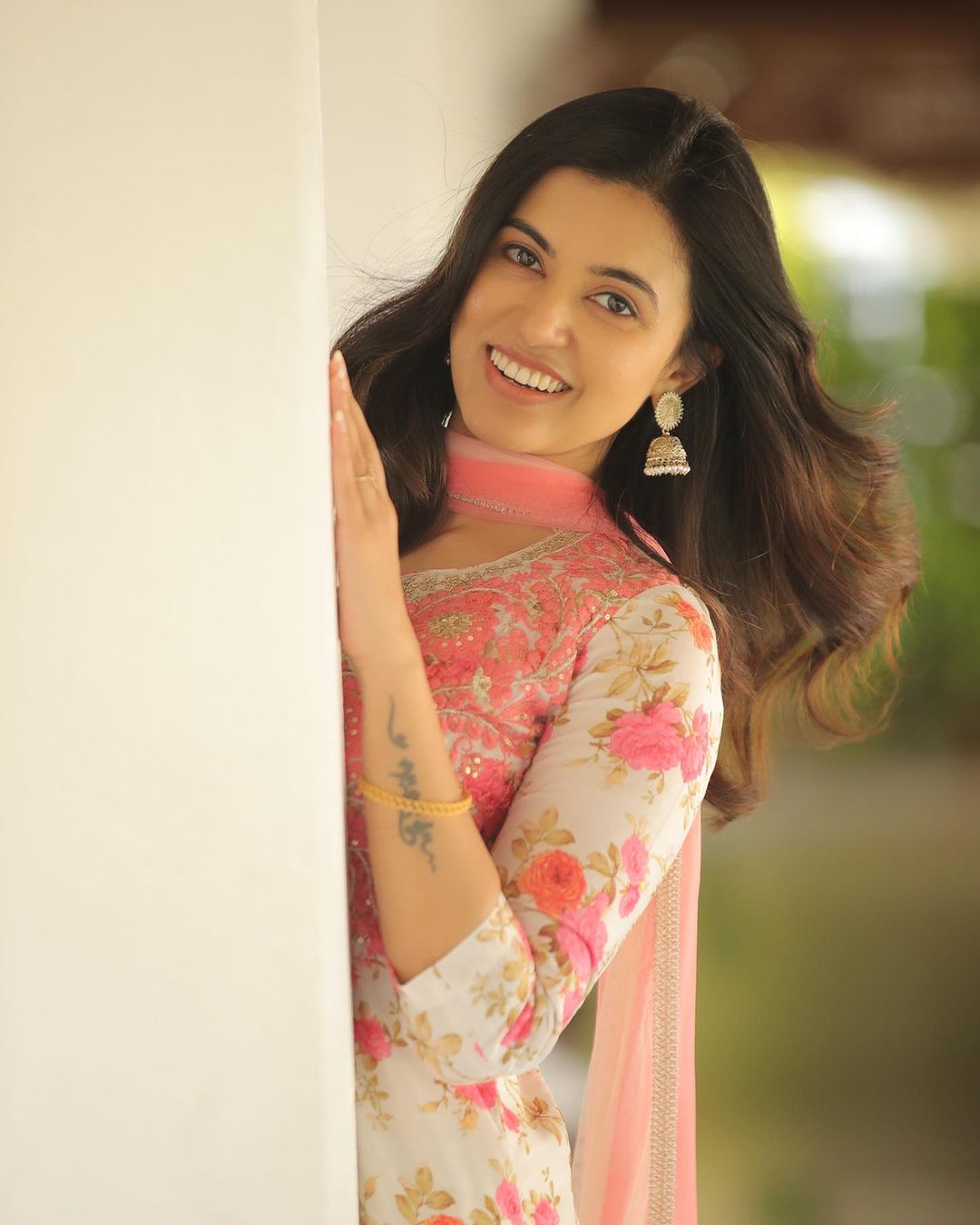 Malayalam Actress Anju Kurian Stills in Pink Color Dress